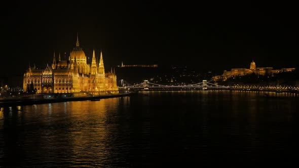 Parliament building in  Hungary located in Budapest night 4K 2160p UltraHD footage - River Danube an