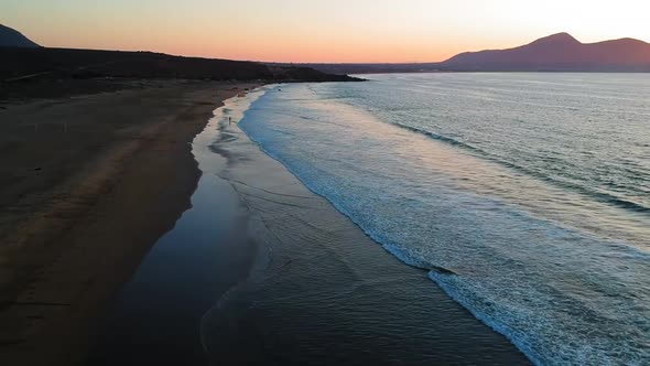 Cinematic footage of shore at sunset, Coquimbo, chile