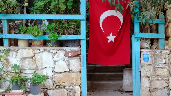 Turkish Flag Hanging on a Country House in Rural Turkey. 