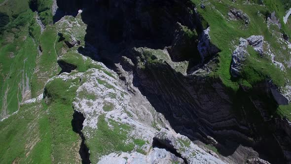 Flying Above Mountain Panorama Overlooking Swiss Alps in Switzerland