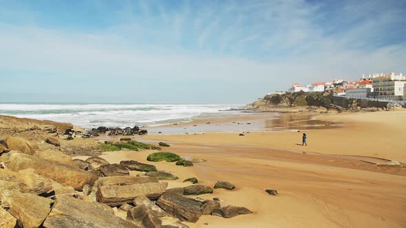 Aerial Drone View of Sandy Beach at Lisbon, Portugal at Praia das Macas, a Beautiful Coastal Town on