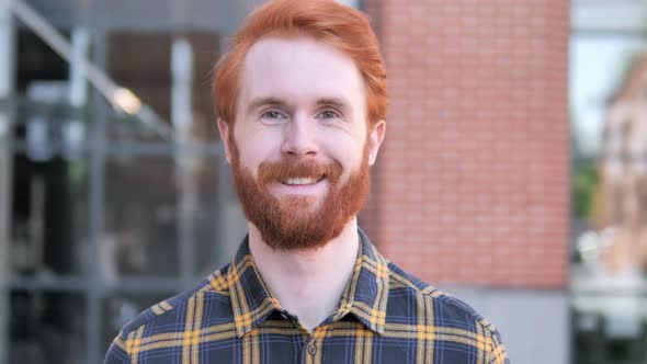 Outdoor Portrait of Smiling Happy Man