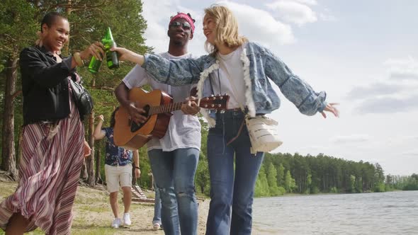 Summer Day With Guitar Near Lake