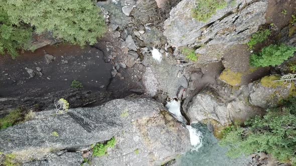 Ascending Over Cliffs And Waterfall