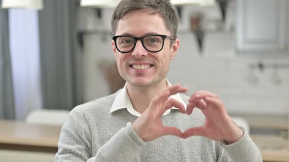 Heart Shape with Hands By Young Man in Love