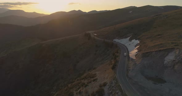 Beautiful Sunset Over the Mountains with Clear Sky