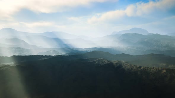 Aerial Vulcanic Desert Landscape with Rays of Light