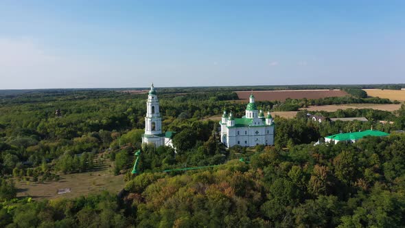 Orthodox Monastery With Green Domes in Ukraine alt
