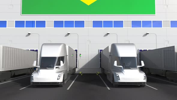 Modern Trucks Load or Unload at Warehouse with Flag of BRAZIL