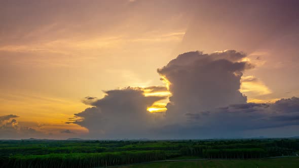 4k Time-lapse, View of Colorful dramatic sky sunset or sunrise with Moving clouds background alt