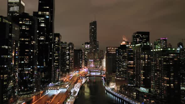 Urban Chicago City and Chicago River at Night in Winter