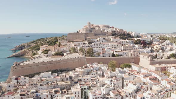 Aerial view of Ibiza city, the Old Town and the city walls of Eivissa, in the island of Ibiza, on a
