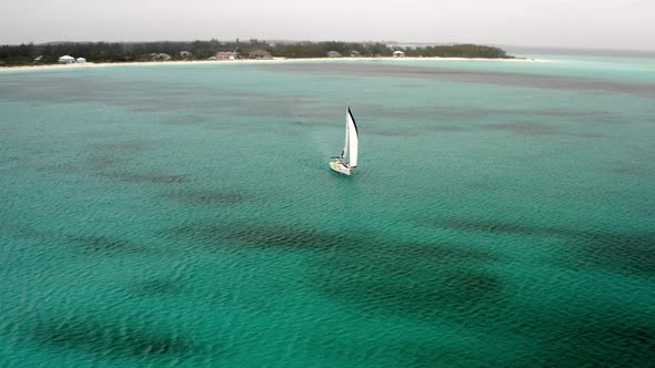 Yachting On Turquoise Ocean Into The Islands Of Bahamas In Florida. - Aerial Orbiting Shot