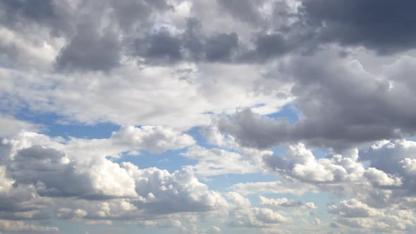 White And Gray Autumn Cumulus Rain Clouds Moving On Sky