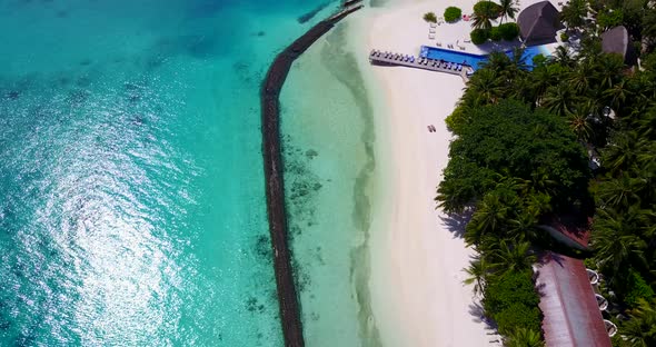 Luxury aerial island view of a sunshine white sandy paradise beach and turquoise sea background