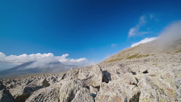 Time-lapse shot of moving white clouds at Abuli Mountain. Georgia