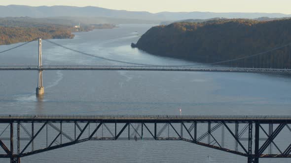 Aerial of walkway and Mid-Hudson Bridge over Hudson river