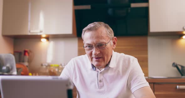 Happy Grey Haired Mature Man in Glasses Screaming Celebrating Success Online Win Successful Bet