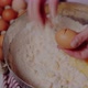 Female Hand Breaks Fresh Chicken Egg Into Bowl - VideoHive Item for Sale