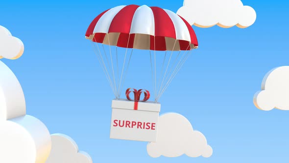 Box with SURPRISE Text Falls with a Parachute