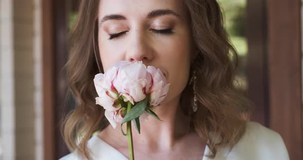 Beautiful Romantic Woman Smells Flower Peony Portrait of Gentle Tender Lady