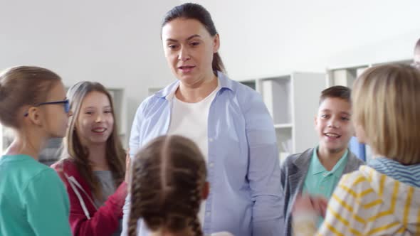 Psychologist Demonstrating Trust Game for Kids alt