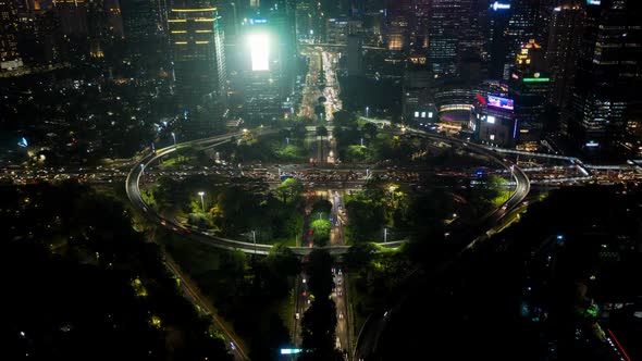 Timelapse of Simpang Susun Semanggi at Night - Jakarta, Indonesia. Busy Highway Intersection