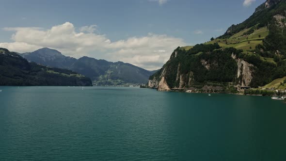 Lakeside Town in the Alps Drone Video Switzerland