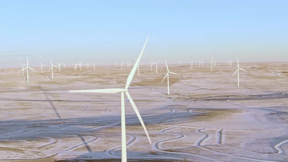 Aerial shots of wind turbines on a cold winter afternoon in Calhan, Colorado