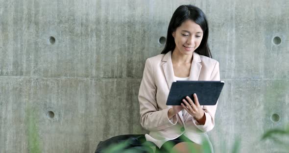 Business woman using tablet computer