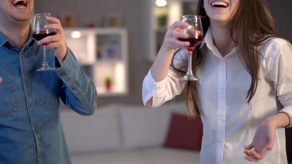 Young friends drinking alcohol and having fun.