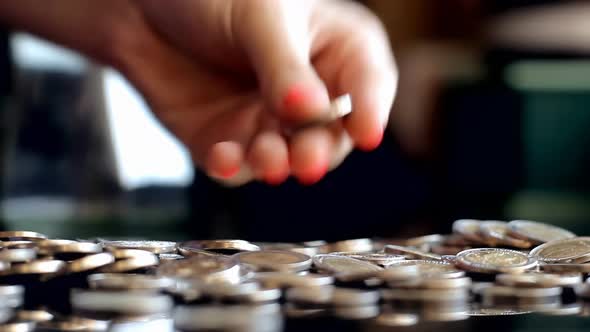 Coin Jar Savings, Woman with a Glass Jar full of Coins. 4K.