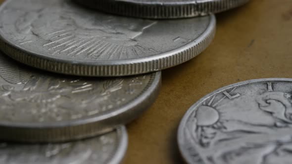 Rotating stock footage shot of antique American coins 