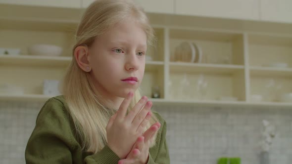 Lovely Preadolescent Hearing Impaired Child Communicating with Sign Language