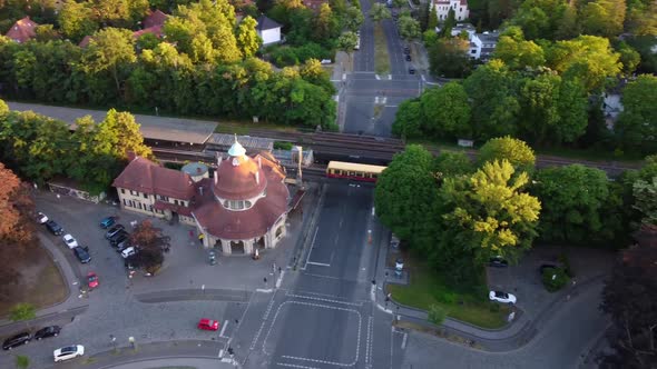 Yellow S-Bahn station over bridgeBeautiful aerial view pursuit flight drone footage of mexikoplatz
