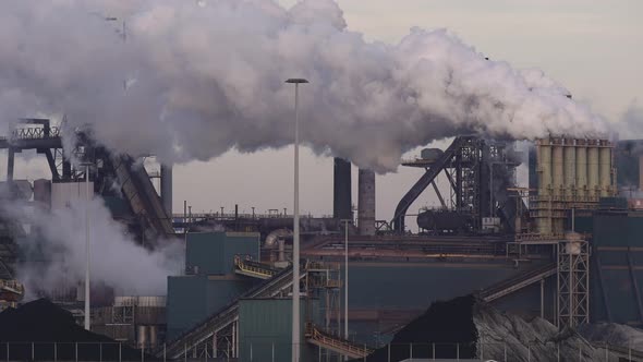 Aerial view of factory Tata Steel with smoking chimneys in Holland