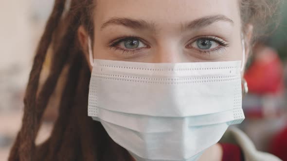 Woman in Face Mask Posing