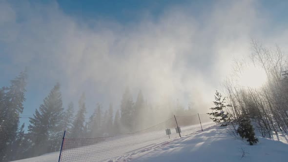 Snow Cannon Generates a Lot of Artificial Snow at Skiresort in Early Winter