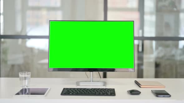 Desktop with Green Chroma Key Screen Zoom In