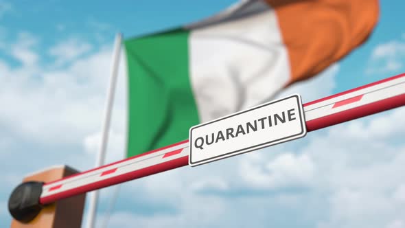 Open Boom Gate with QUARANTINE Sign at Flag of Ireland