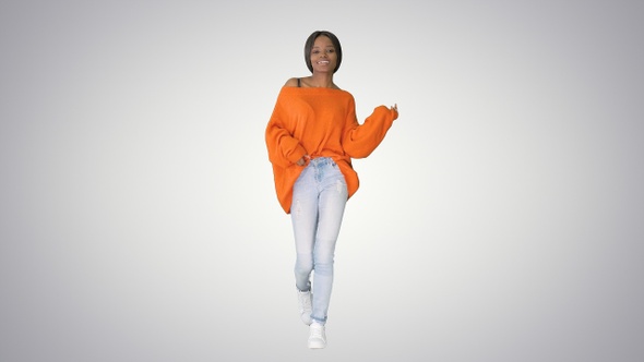 African American Girl Dancing Walking on Gradient Background