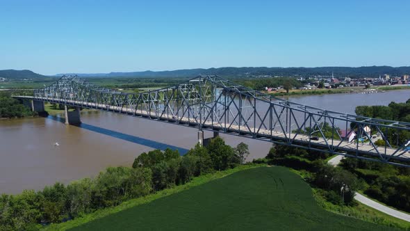 Carl Perkins Bridge crossing the Ohio River from Kentucky, aerial drone footage