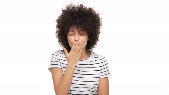 Portrait of Sensual Adorable Young Woman with Afro Hairstyle Showing Her Feelings Blowing Air Kiss