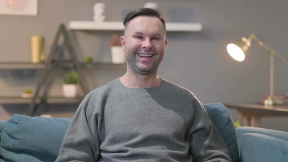 Portrait of Casual Man Smiling at the Camera