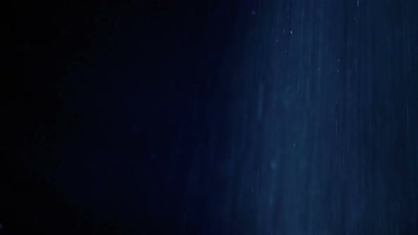 Water Spray Against Black Background alt