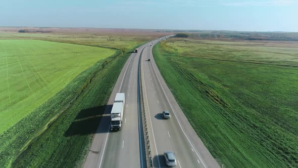 A Drone Flies Along the Highway