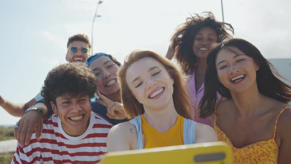 Group of friends having fun on the beach.