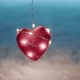 Red heart hanging on the white carpet - VideoHive Item for Sale