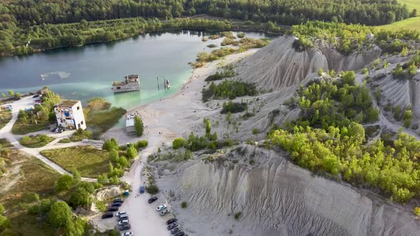 Sand Hills of Quarry With a Pond and Abandoned Prison in Rummu Estonia Europe. Aerial Dron Shoot.