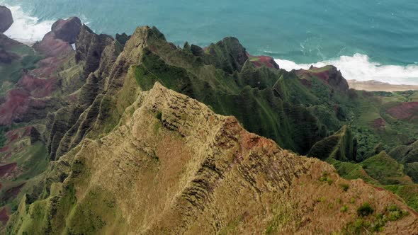 Amazing Hawaiian Mountain Range Going Down To the Ocean. Scenic Aerial Footage.